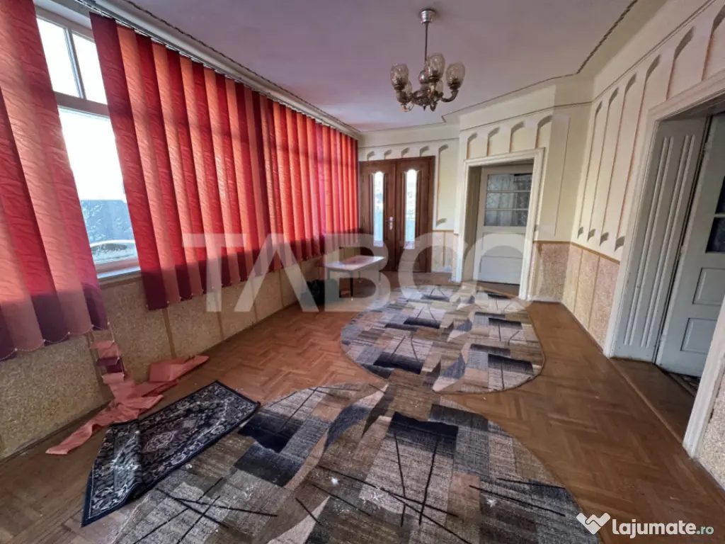 Casa cu potential de investitie 280 mp utili teren liber 206 