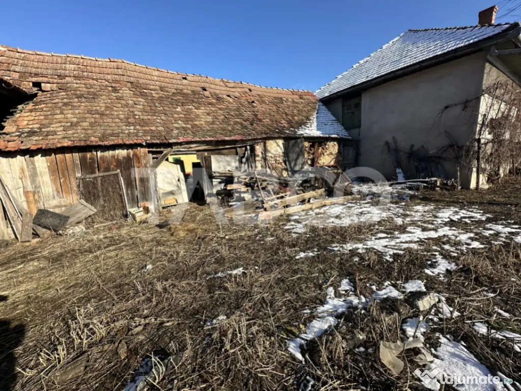 Casa cu potential de investitie 280 mp utili teren liber 206 