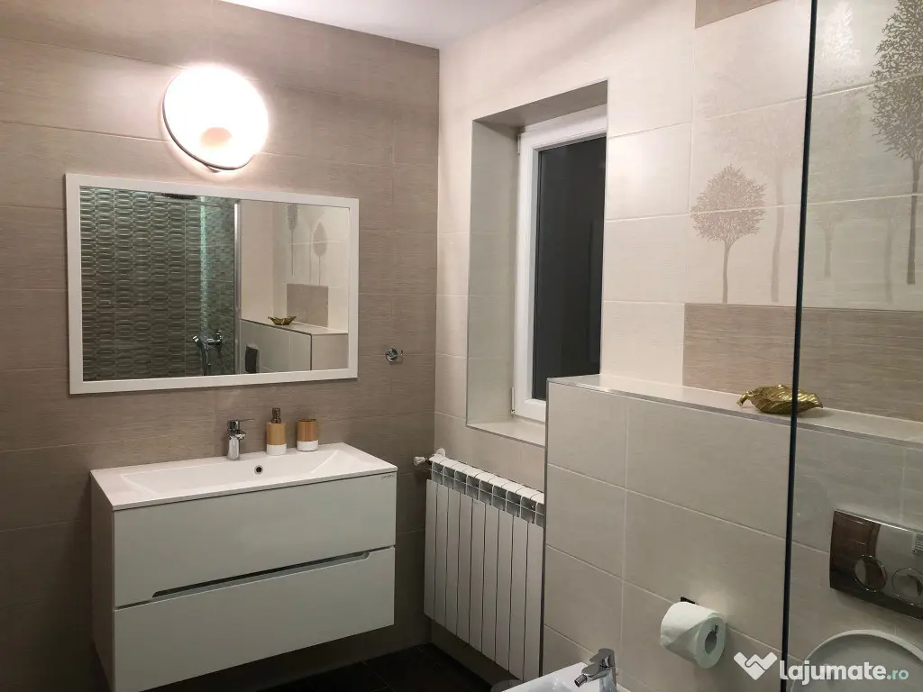 Apartament cu patru camere ,mobilat si utilat. 