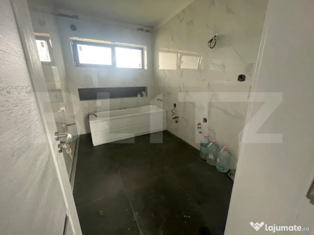 Casă practică și confortabilă, poziționată într-o zon