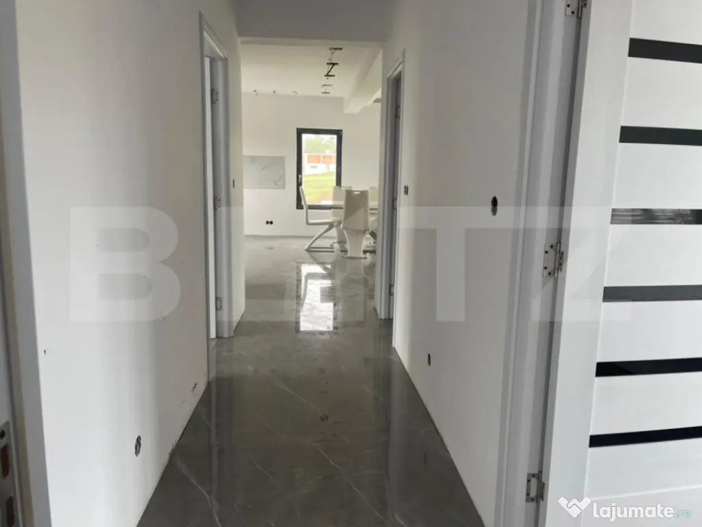 Casă practică și confortabilă, poziționată într-o zon