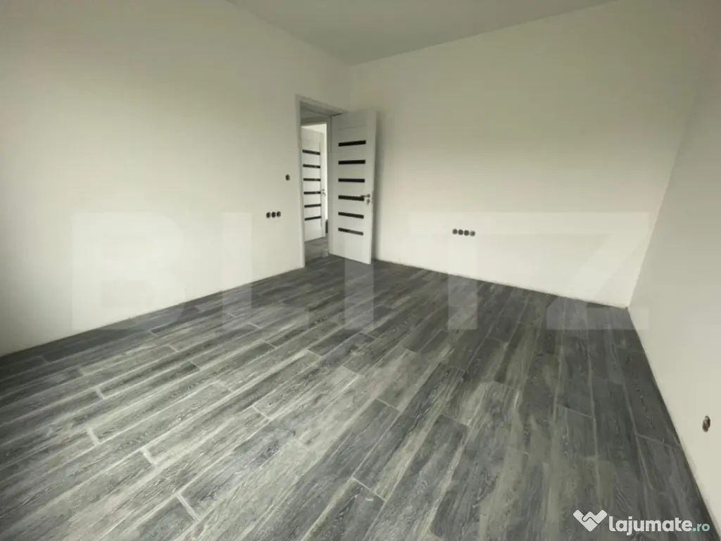 Casă practică și confortabilă, poziționată într-o zon