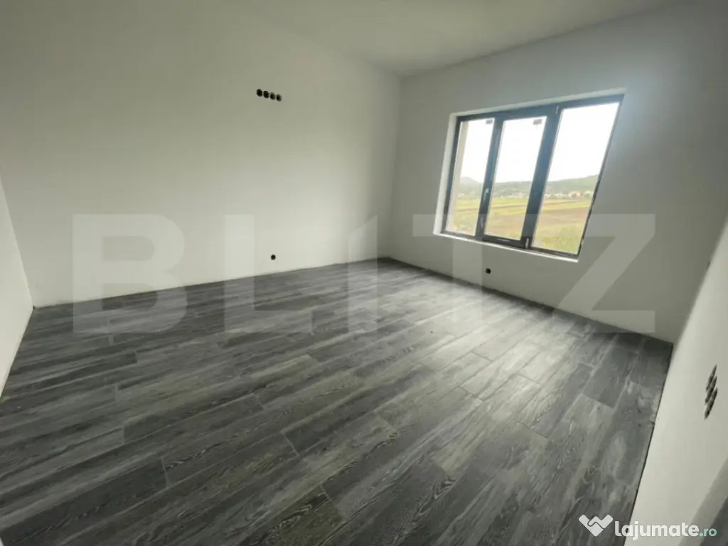 Casă practică și confortabilă, poziționată într-o zon