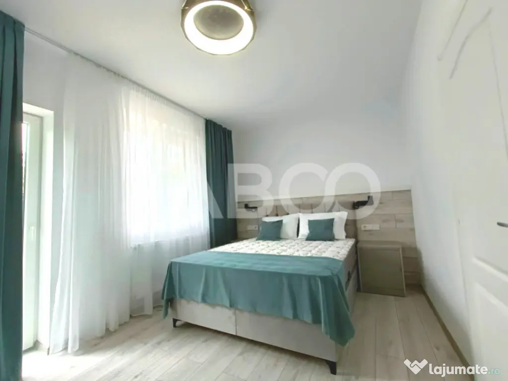 Apartament 2 camere - mobilat modern - curte proprie cu fili