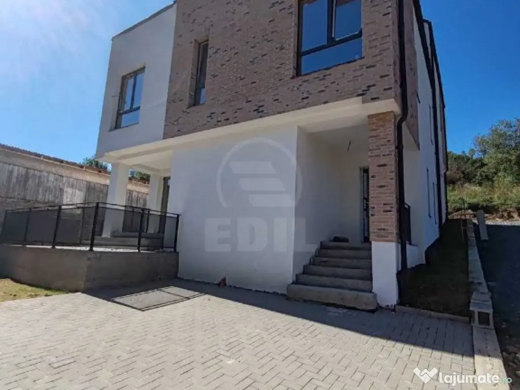 Duplex modern cu 4 camere și terasă, zonă verde – Tăuți 
