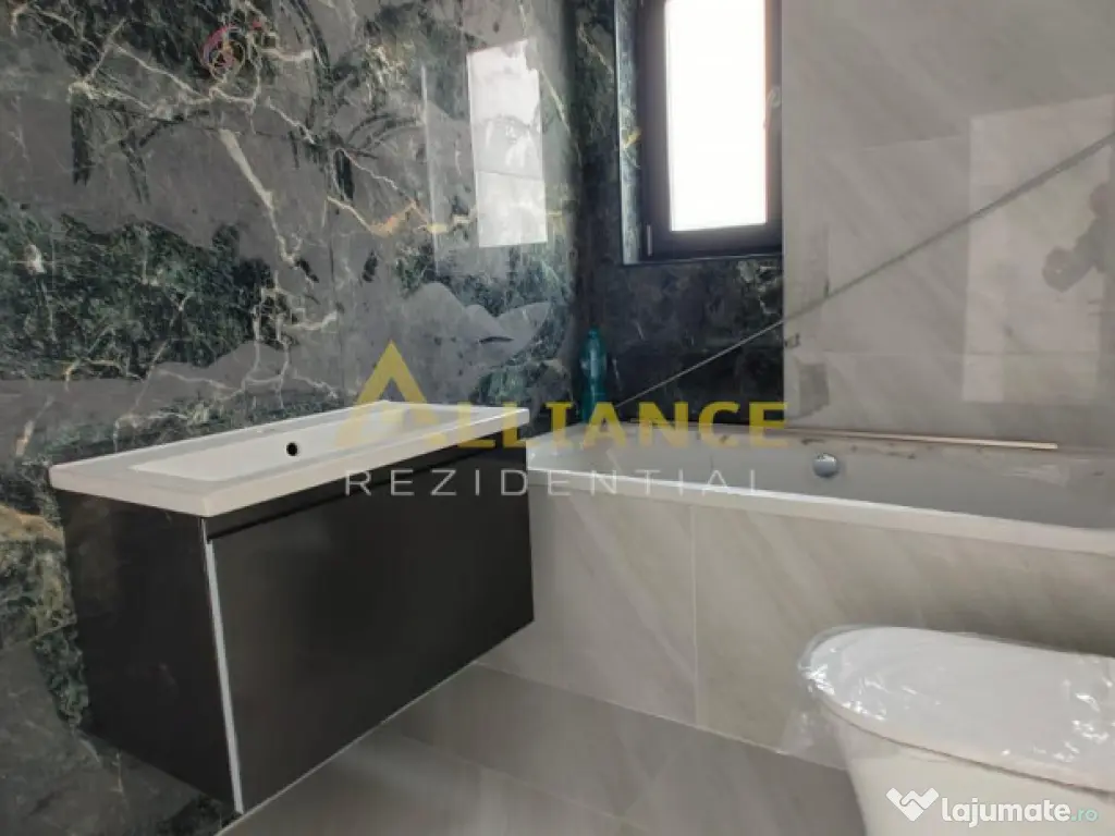 Casa individuala - 4 camere - 3 bai - 110 mp utili 