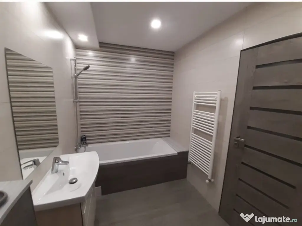 Apartament 2 camere spatios 58 mp,etaj 1, parcare privata Floresti 