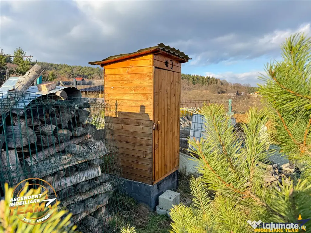 Teren intravilan 520 mp cu casuta din lemn,zona linistita,ap 