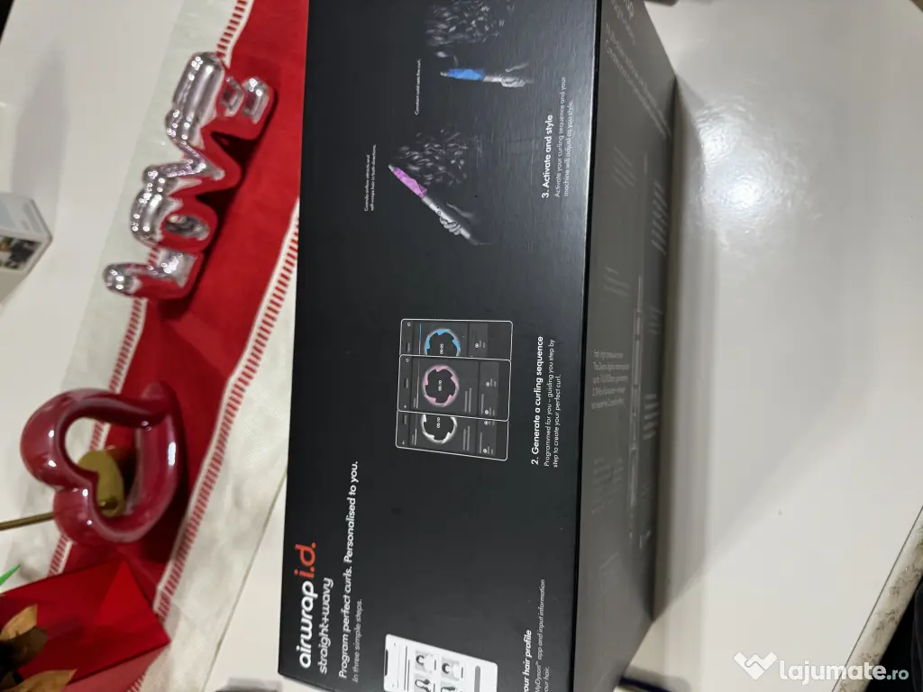 Dyson air wrap sigilat negociabil 