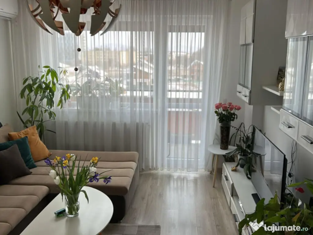 Apartament cu 2 camere mobilat utilat, cu loc de parcare par 