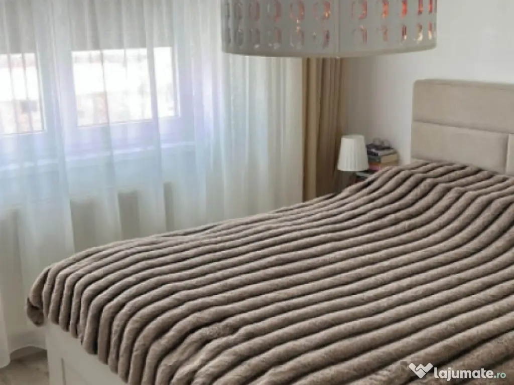 Apartament cu 2 camere mobilat utilat, cu loc de parcare par 