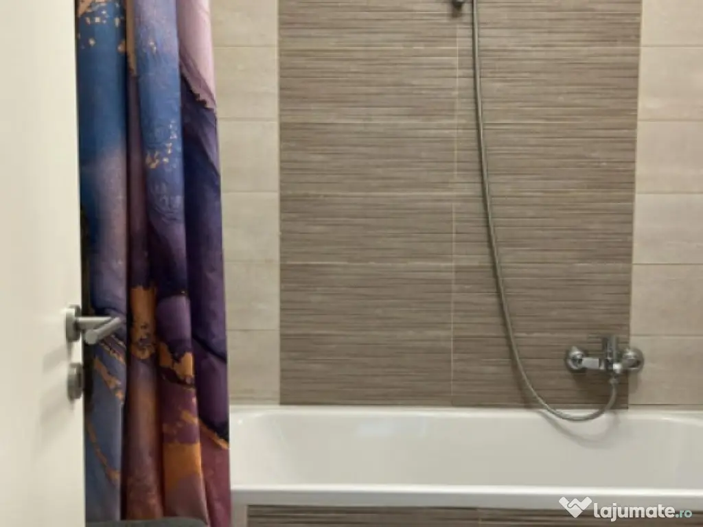 Apartament cu 2 camere mobilat utilat, cu loc de parcare par 