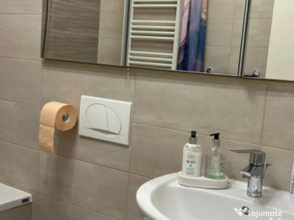 Apartament cu 2 camere mobilat utilat, cu loc de parcare par 