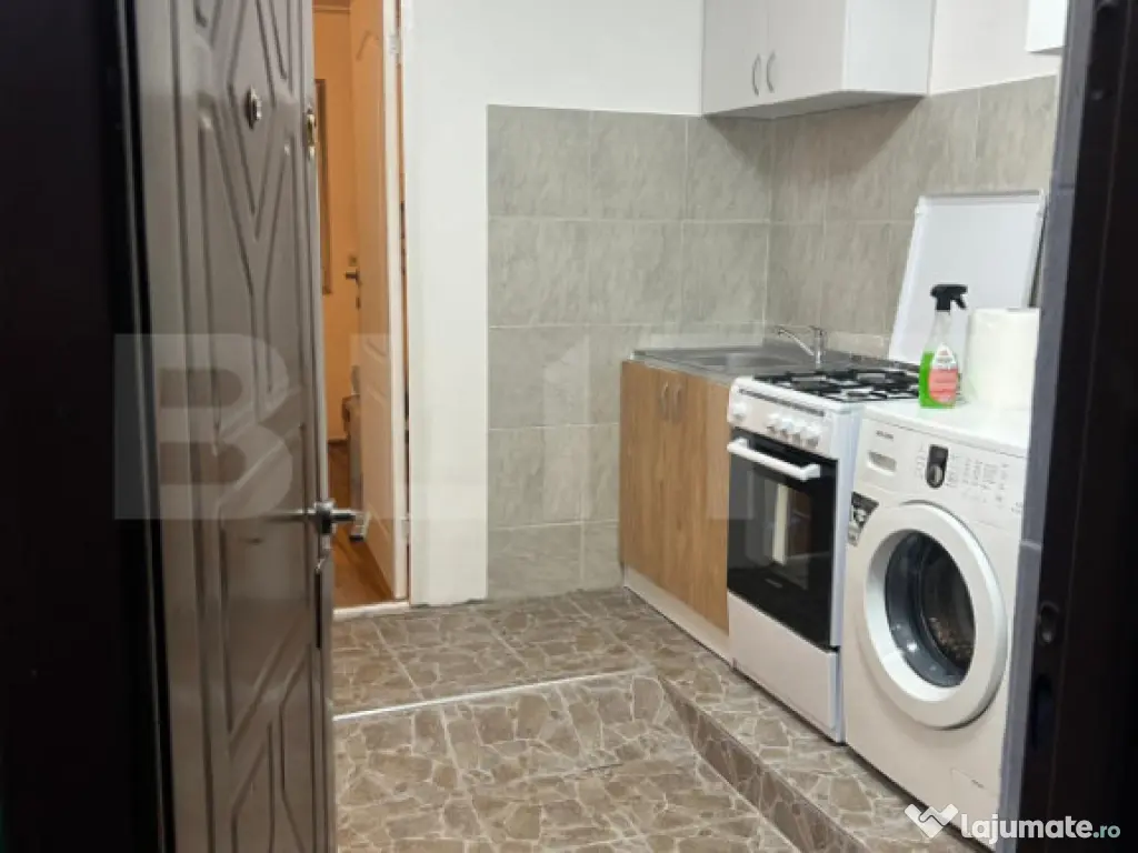 Garsoniera cu baie proprie, 24 mp, etaj 2, centrala, mobilat