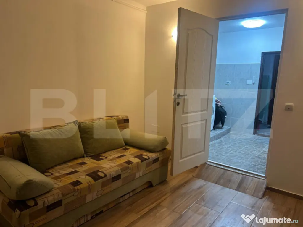 Garsoniera cu baie proprie, 24 mp, etaj 2, centrala, mobilat