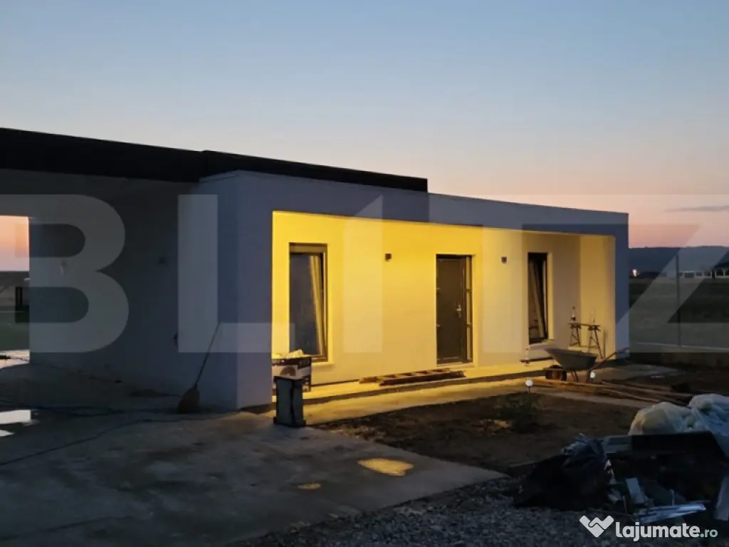 Casa individuala Osorhei cu filigorie si gard imprejmuire