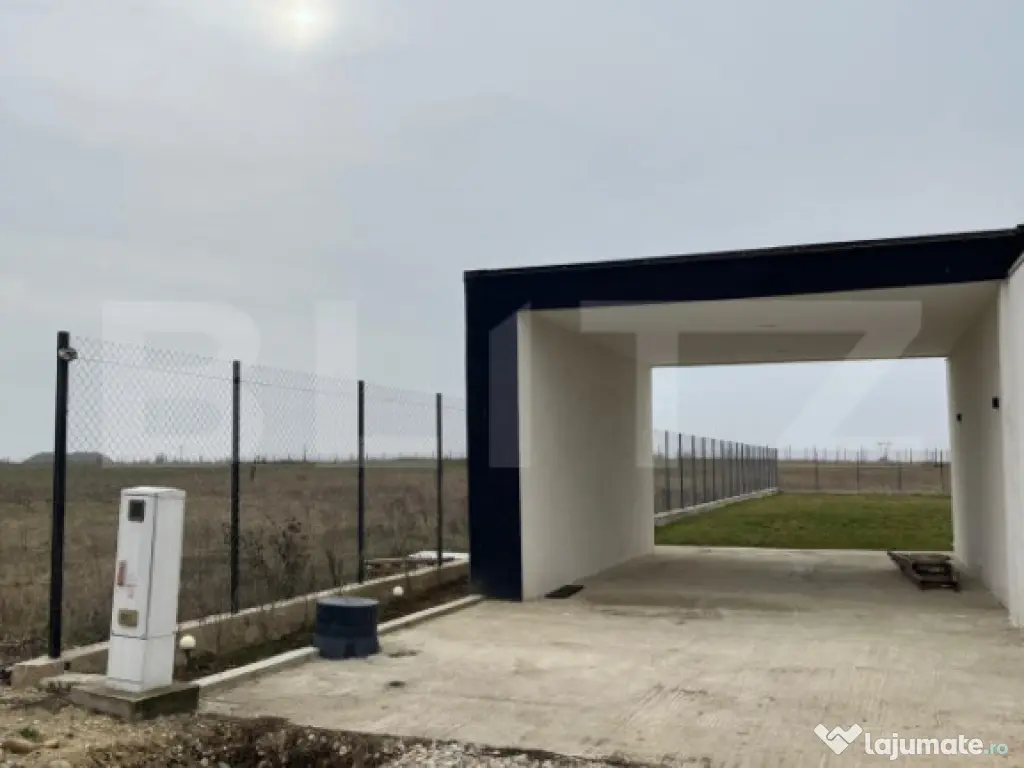 Casa individuala Osorhei cu filigorie si gard imprejmuire