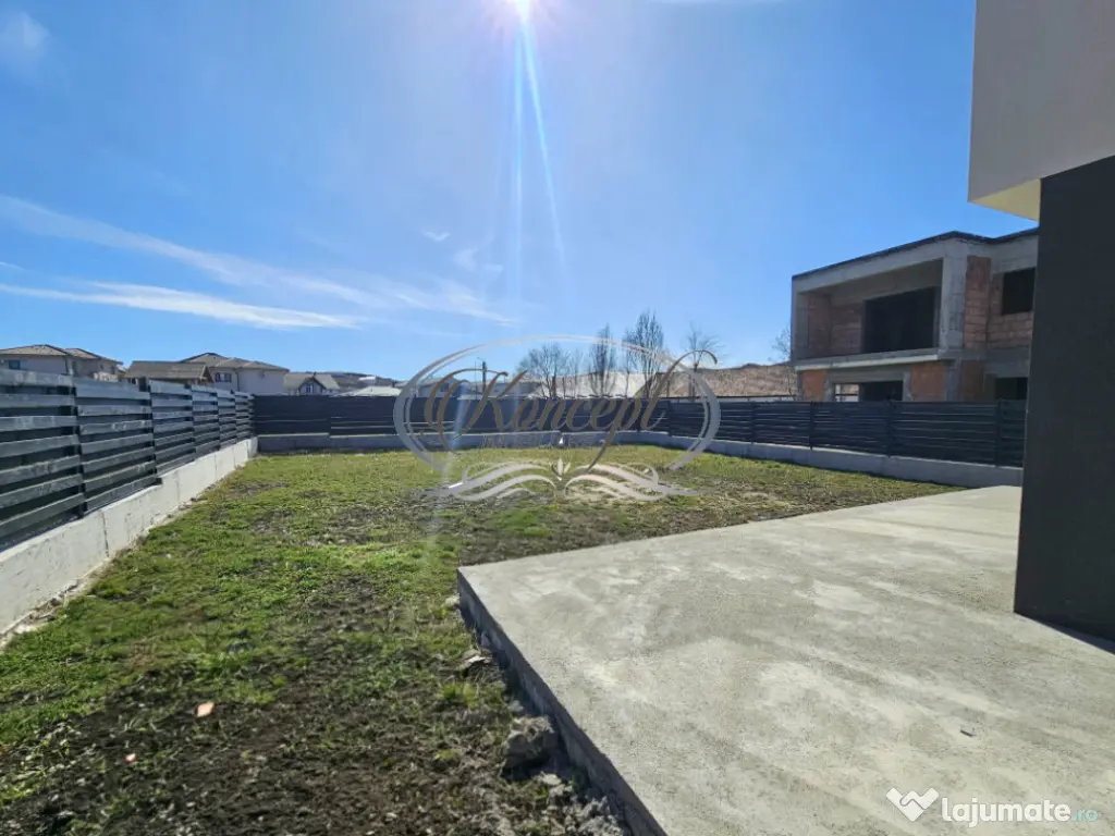 Locuinta moderna cu design cubic si curte plana in Dezmir 