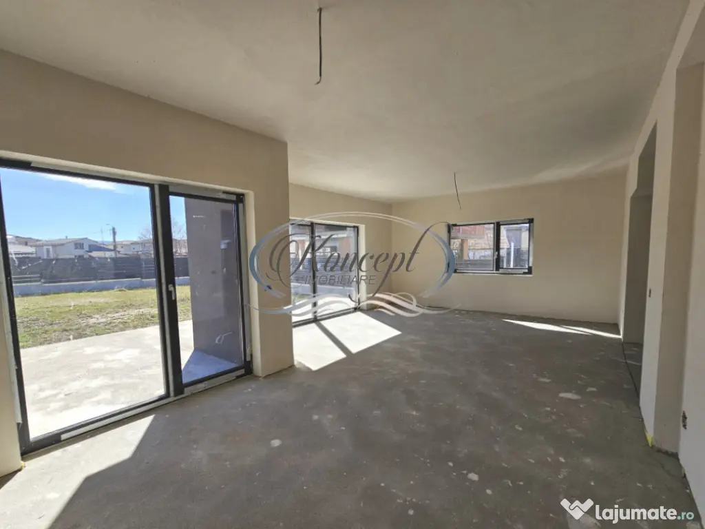 Locuinta moderna cu design cubic si curte plana in Dezmir 