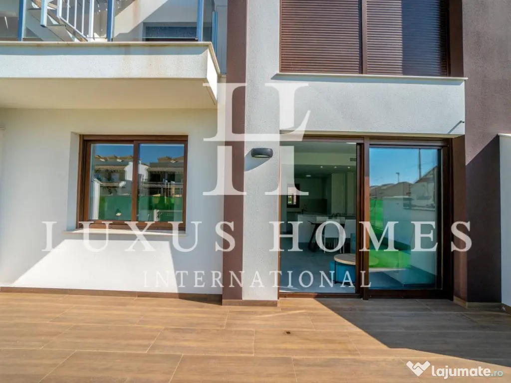 Apartament la parter cu terasă, acces la piscină situat într-un cartier liniștit 