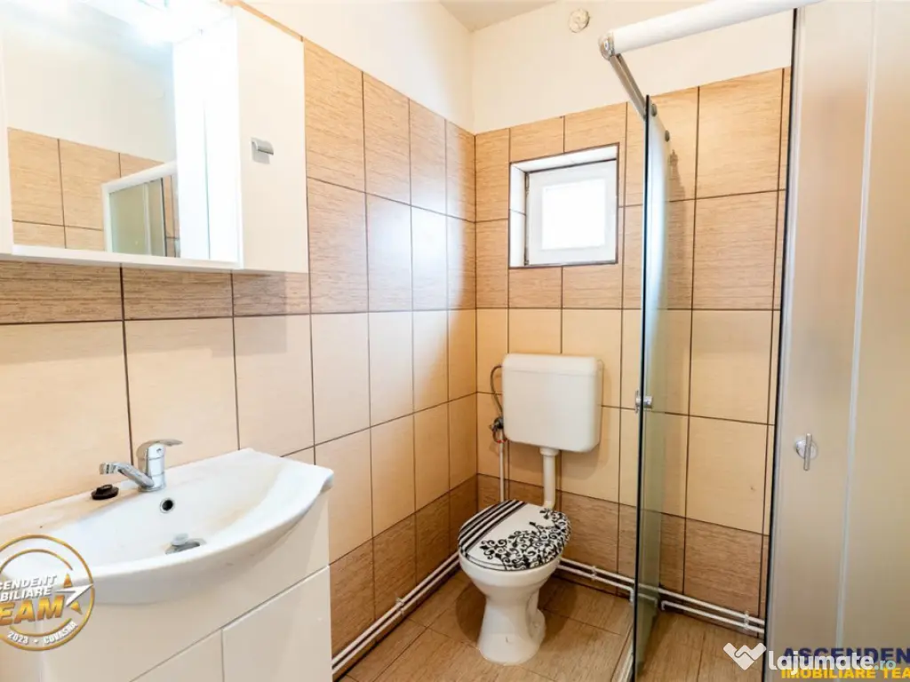 Accesibilitate si farmecul unei case cu garaj, locatie de re