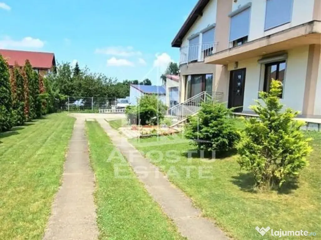 Casa individuala cu 6 camere,3 bai, garaj, teren 1362 mp