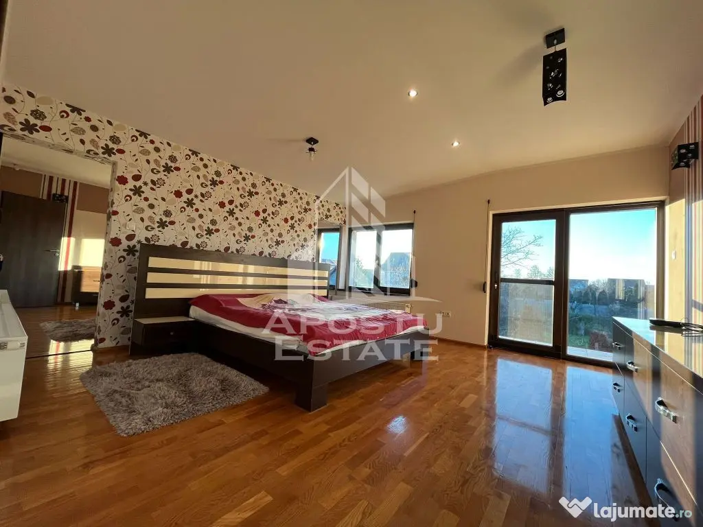 Casa individuala cu 6 camere,3 bai, garaj, teren 1362 mp