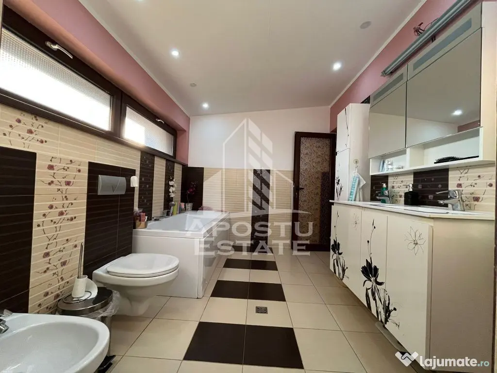 Casa individuala cu 6 camere,3 bai, garaj, teren 1362 mp