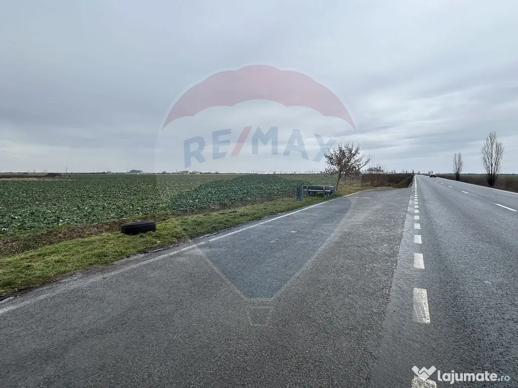 Teren intravilan 80500mp. aproape de nodul rutier de pe D... 