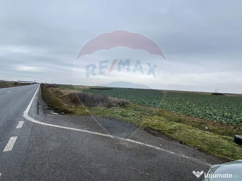 Teren intravilan 80500mp. aproape de nodul rutier de pe D... 