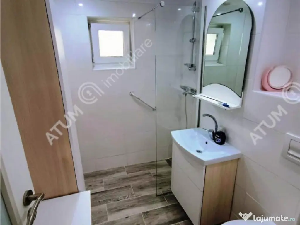 Apartament renovat cu 3 camere 2 bai si pivnita in Sibiu 