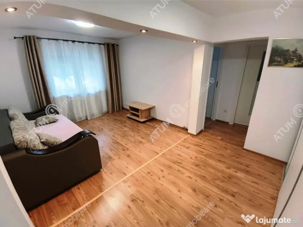 Apartament renovat cu 3 camere 2 bai si pivnita in Sibiu 