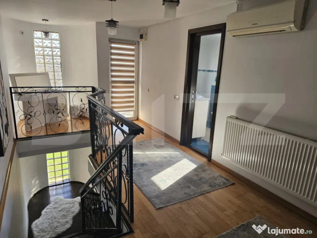 Acasă, în spatele parcului: casă inteligentă cu birou, t