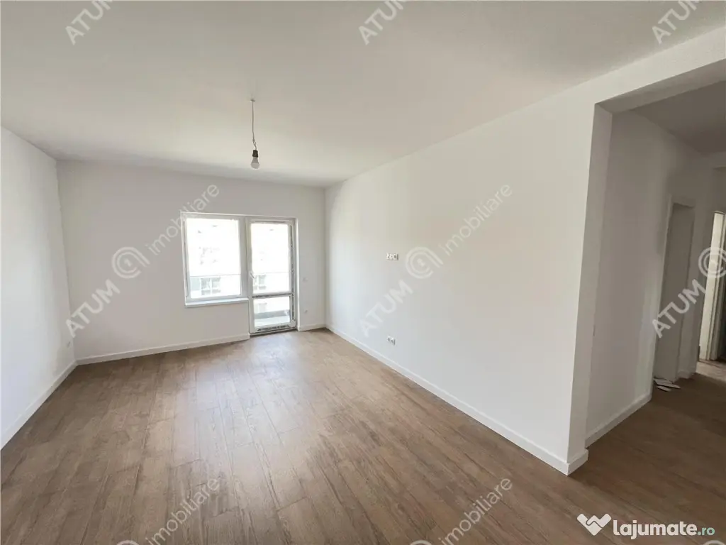 Apartament 2 camere balcon gradina si loc parcare zona Doamn