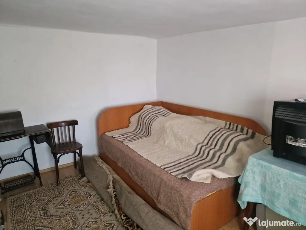 Casa in mediu rural cu teren 