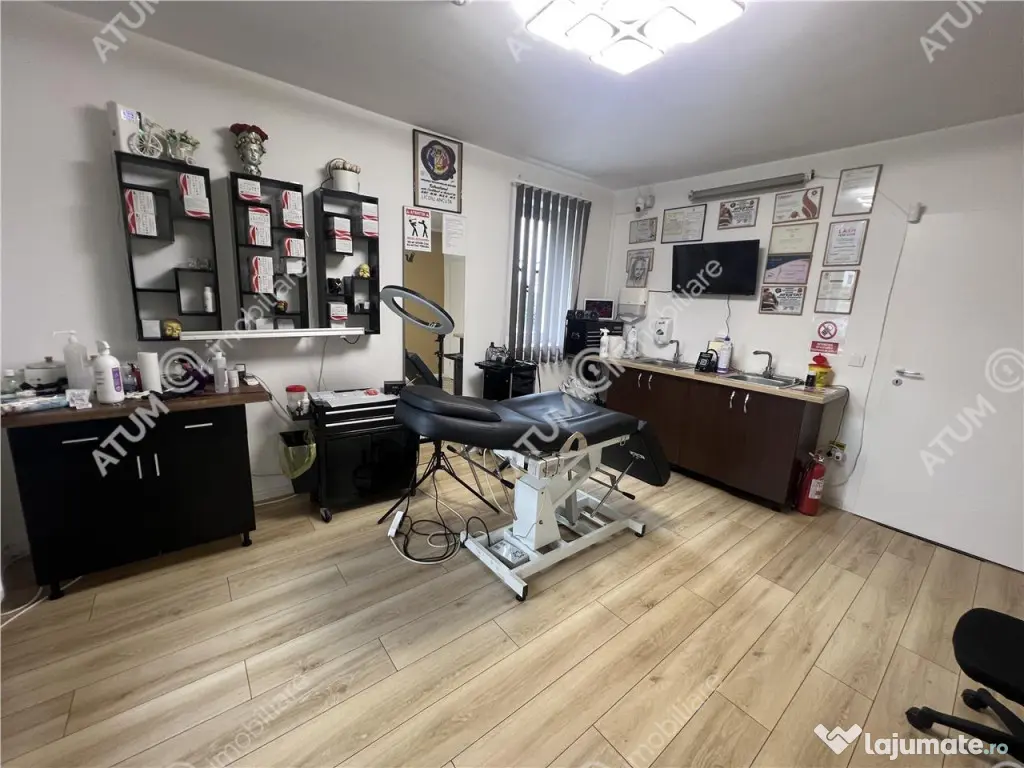 Spatiu comercial de 2 camere cu 2 bai 3 locuri de parcare zo 