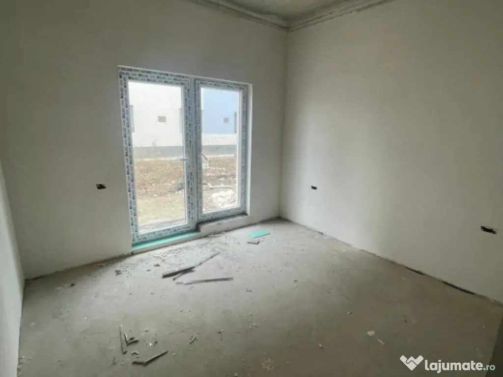 Apartament 2 camere 53 mp + curte 26 mp, toate utilitatile