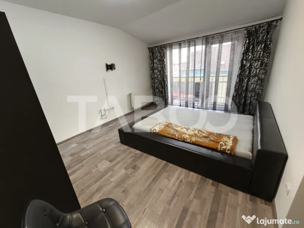 Garsoniera decomandata de vanzare balcon parcare Alma Turnis