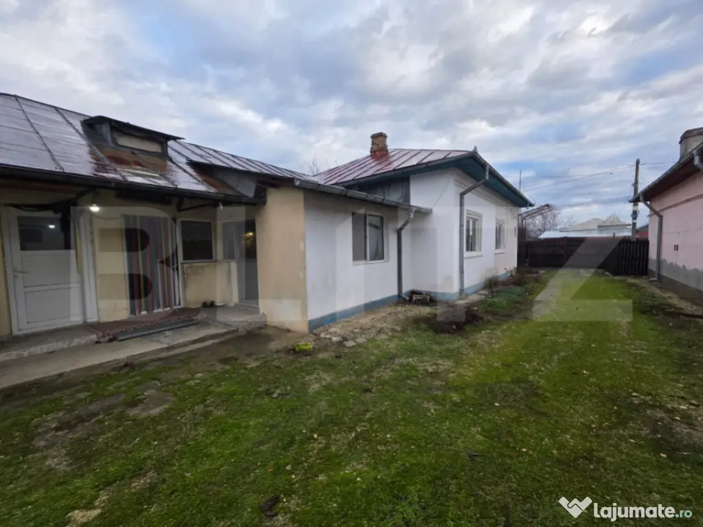 Casă cu teren generos și baltă de pescuit – Găești 