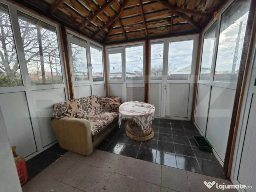 Casă cu teren generos și baltă de pescuit – Găești 