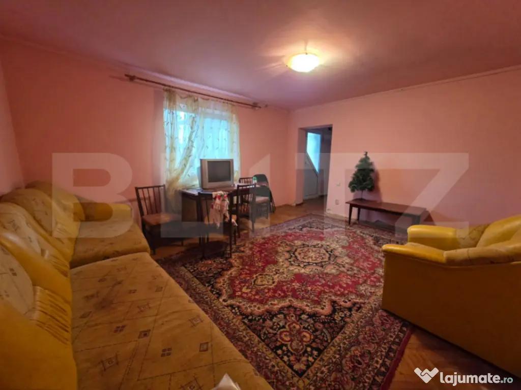 Casă cu teren generos și baltă de pescuit – Găești 