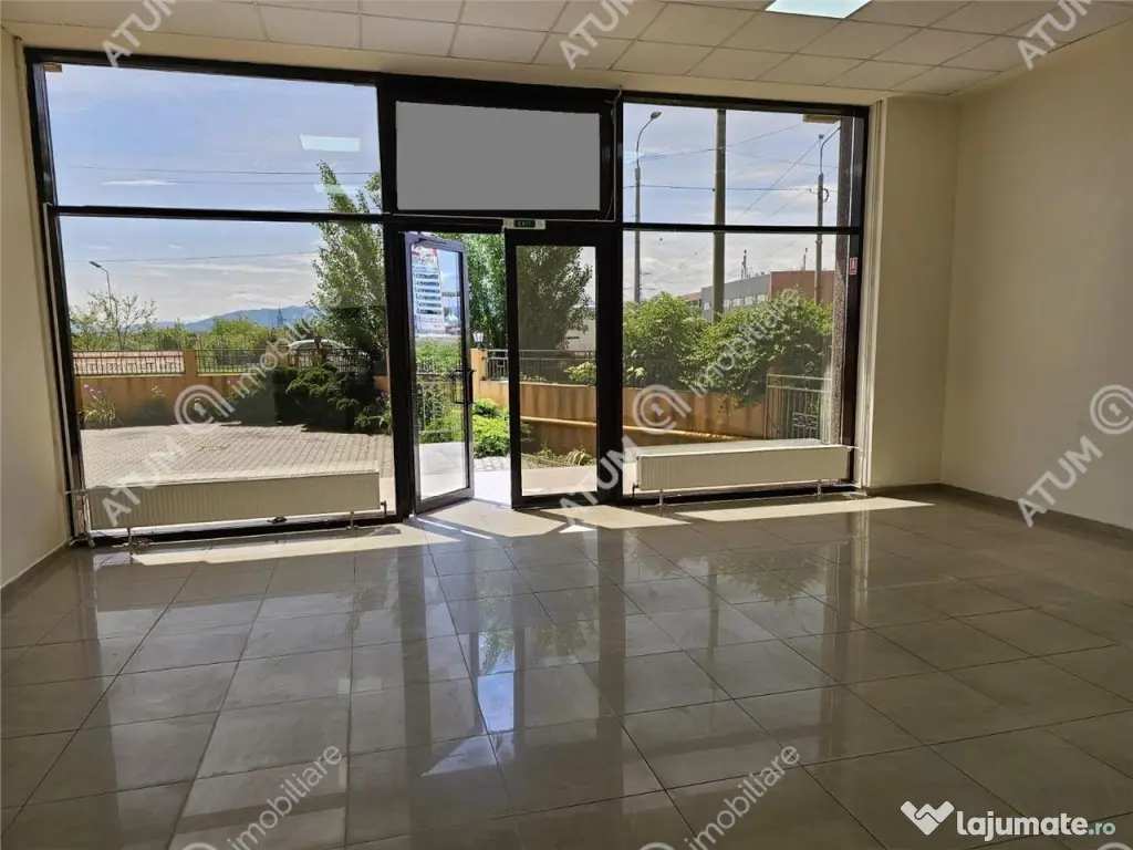 Spatiu comercial cu vad 132 mp utili si 6 locuri de parcare 