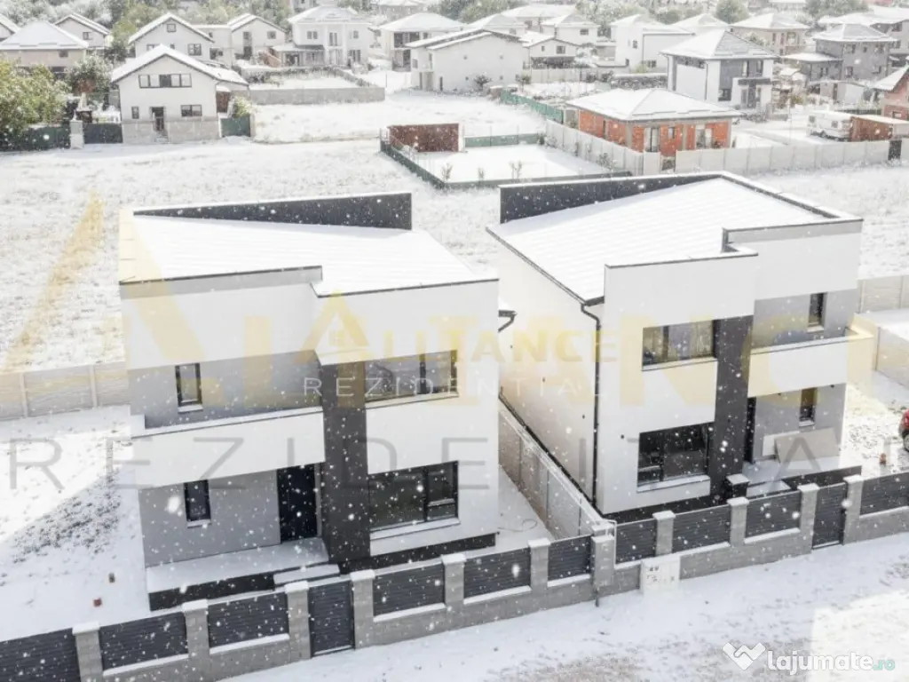 Casa e cu 4 camere 2 bai teren 455mp 