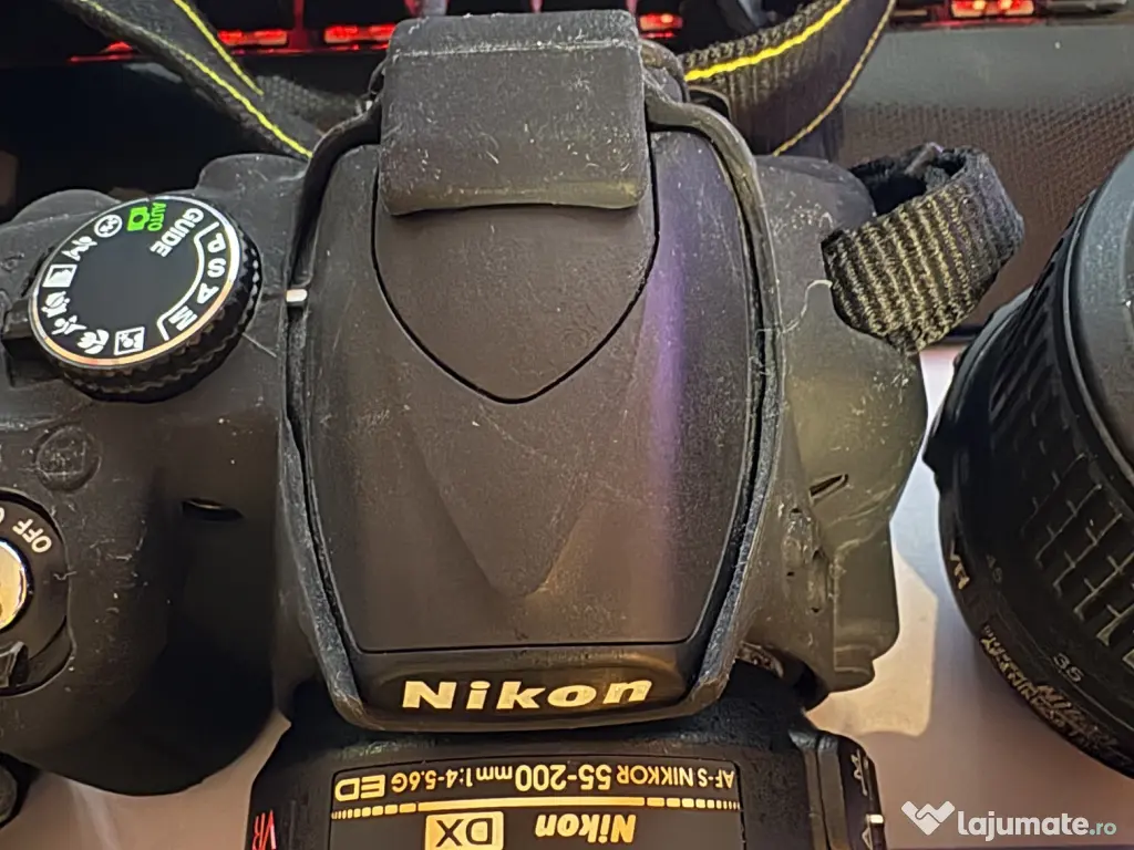 Nikon D3100 cu obiectivele 18-55mm + 55-200mm 