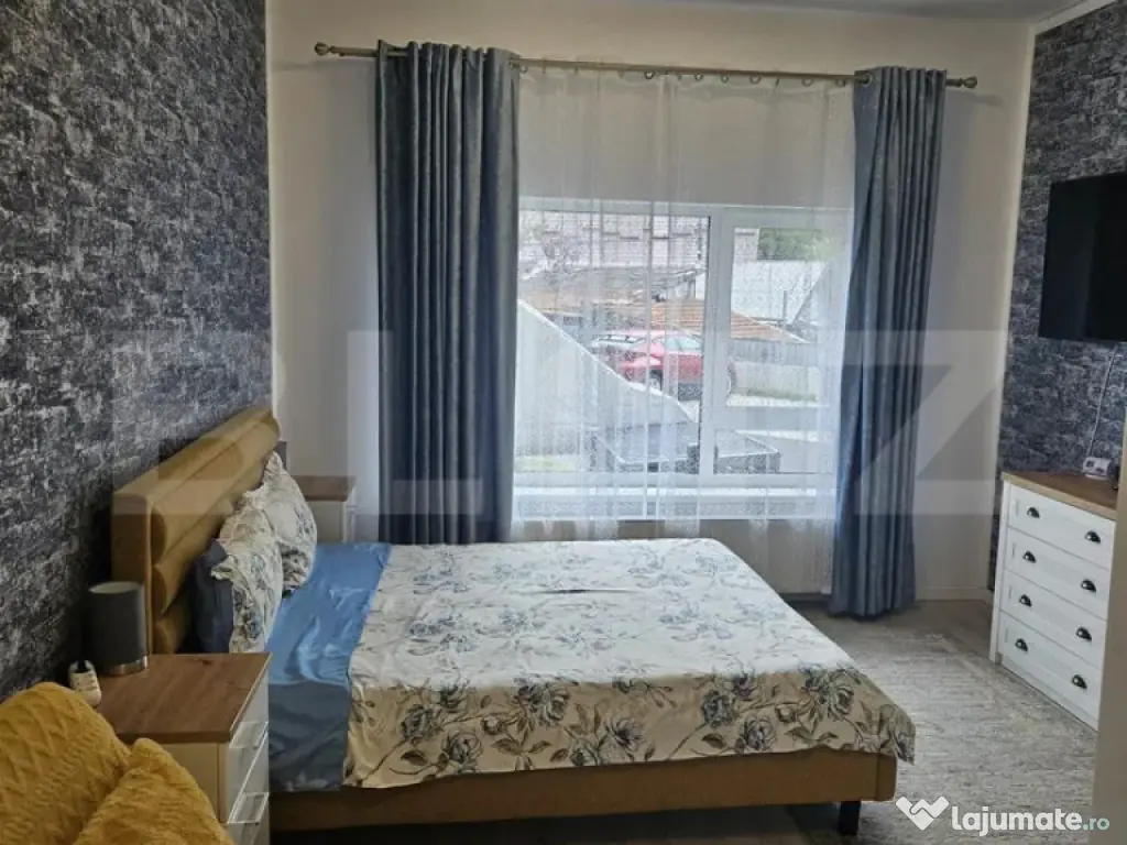 Apartament modern cu parcare – zona Noua 