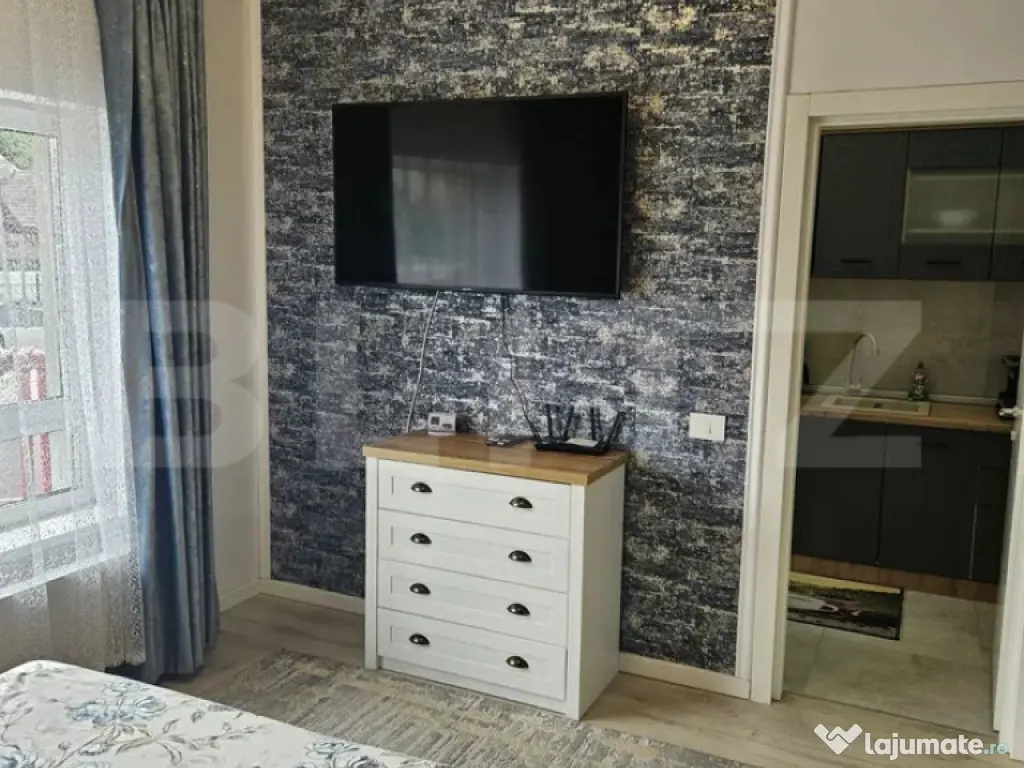 Apartament modern cu parcare – zona Noua 