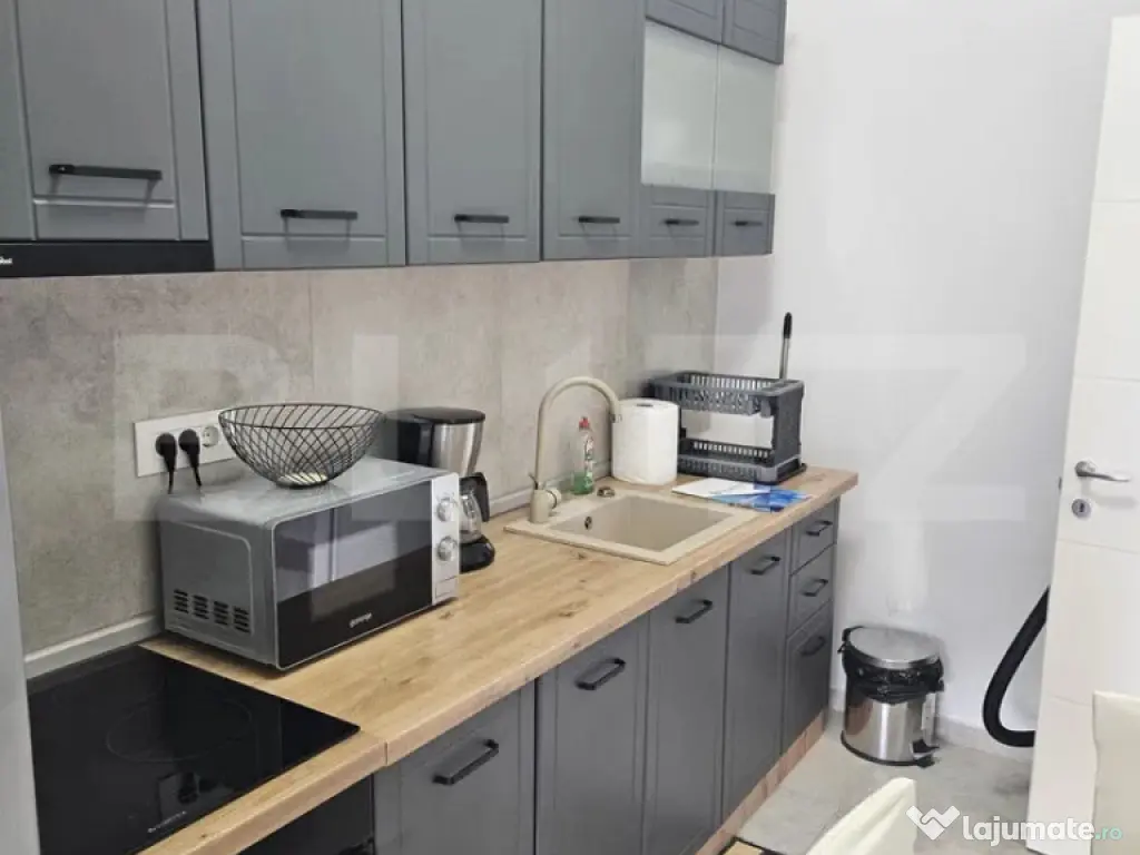 Apartament modern cu parcare – zona Noua 