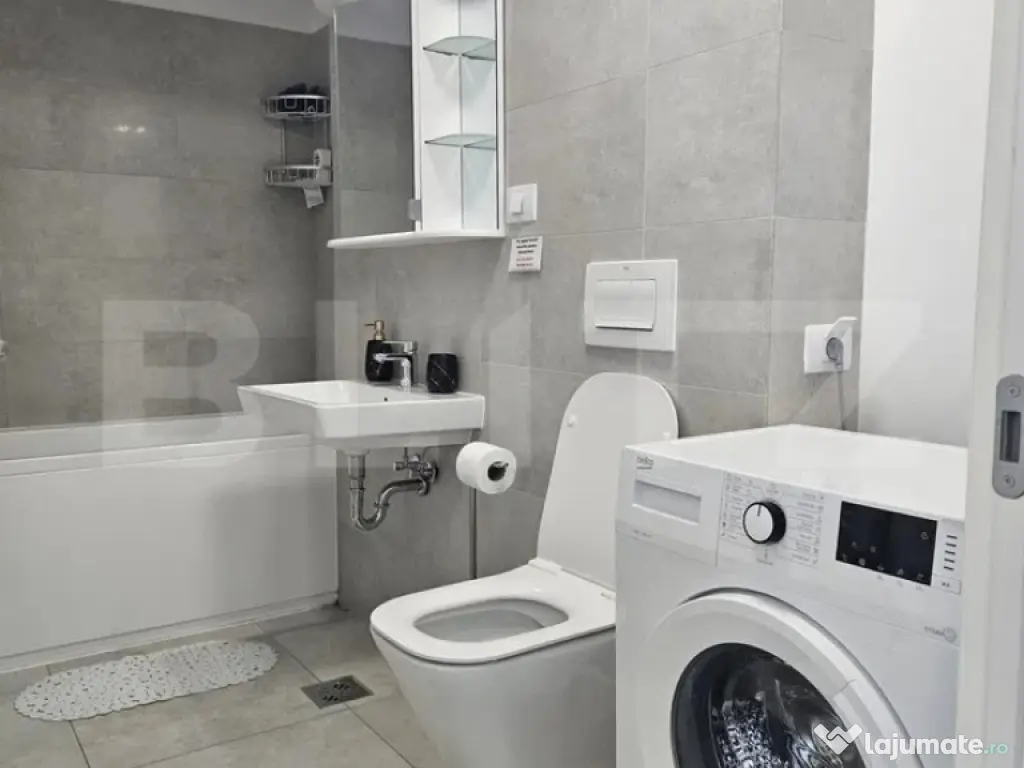 Apartament modern cu parcare – zona Noua 