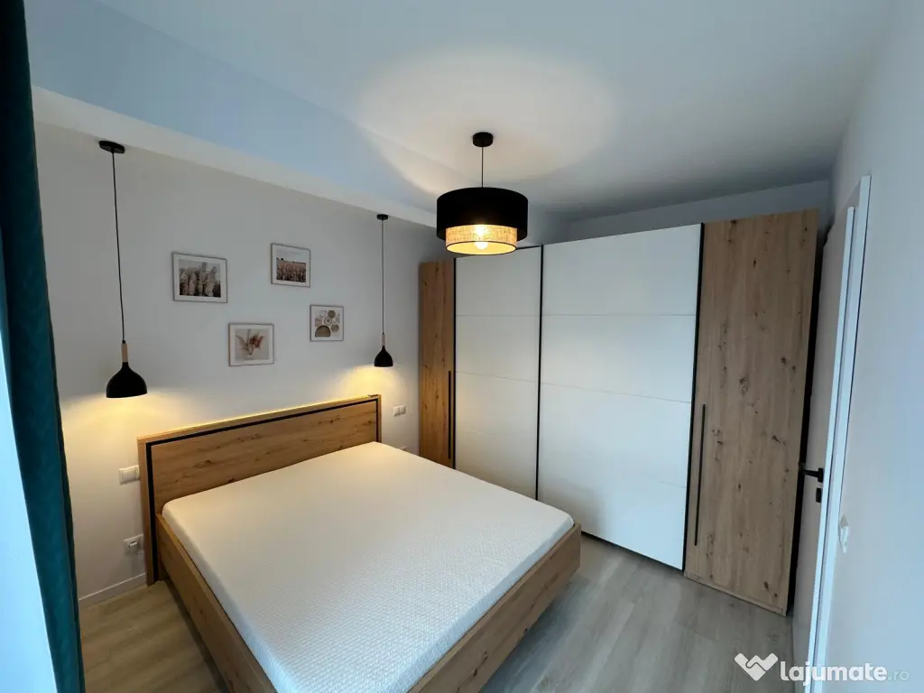 Închiriez apartament 2 camere + parcare subterana 