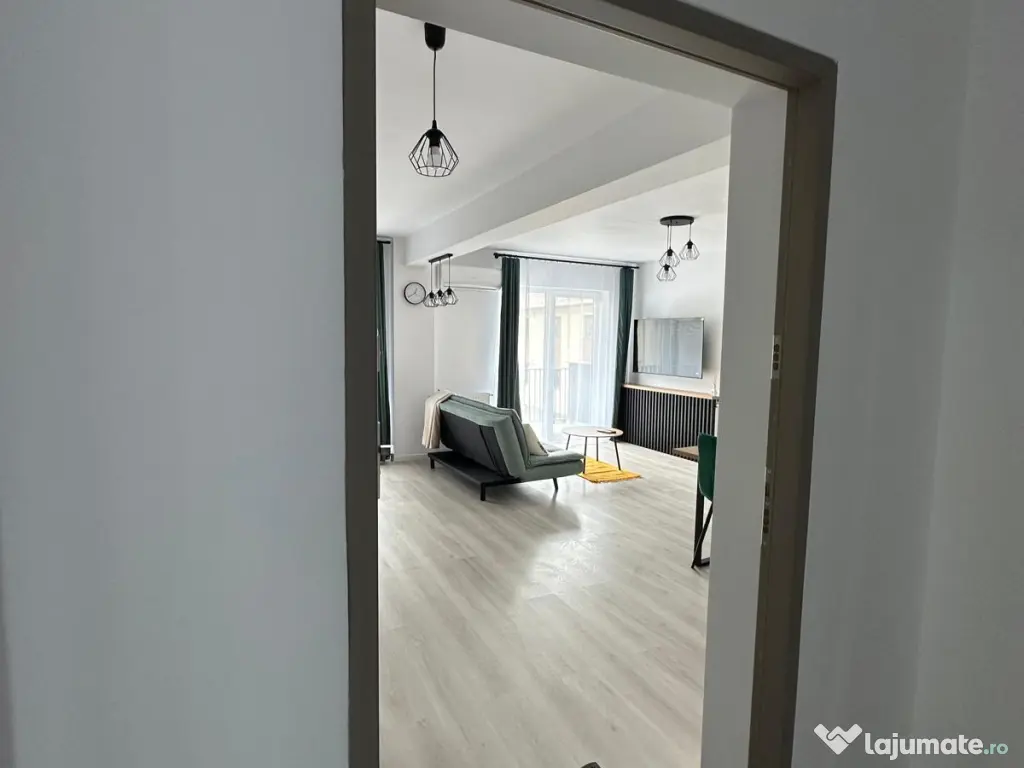 Închiriez apartament 2 camere + parcare subterana 